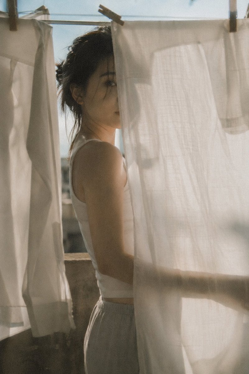A prompt for creating nostalgic, soft-backlit domestic scenes with a film-like quality and poetic realism.