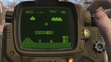 A first-person perspective shot of a user looking at a retro-futuristic wrist-mounted computer resembling a Pip-Boy. The device has a weathered olive-drab metal casing, various analog dia...