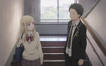 A high-quality 2D anime screenshot of two students talking on a Japanese school stairwell landing. On the left, a blonde anime girl with red eyes, wearing a cream sweater and plaid skirt...